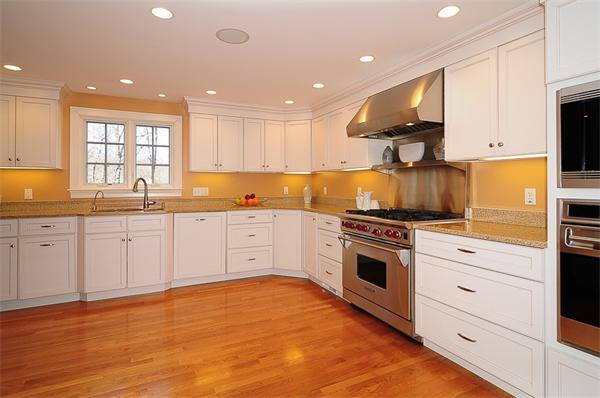 62 Fiske Road Wellesley, MA 02481 - Photo 3 of 25 a kitchen with granite countertop a sink stainless steel appliances and cabinets