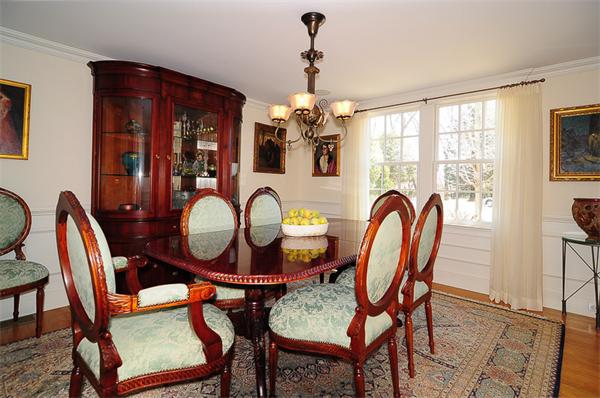 62 Fiske Road Wellesley, MA 02481 - Photo 4 of 25 a dining room with furniture a chandelier and window