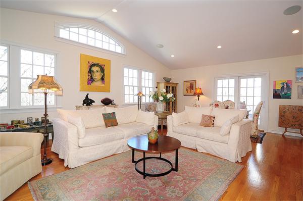 62 Fiske Road Wellesley, MA 02481 - Photo 7 of 25 a living room with furniture and a table