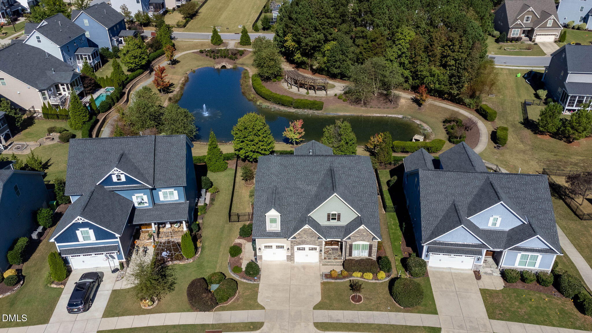 7740 Wilderness Road Raleigh, NC 27613 - Photo 2 of 47 an aerial view of houses with outdoor space