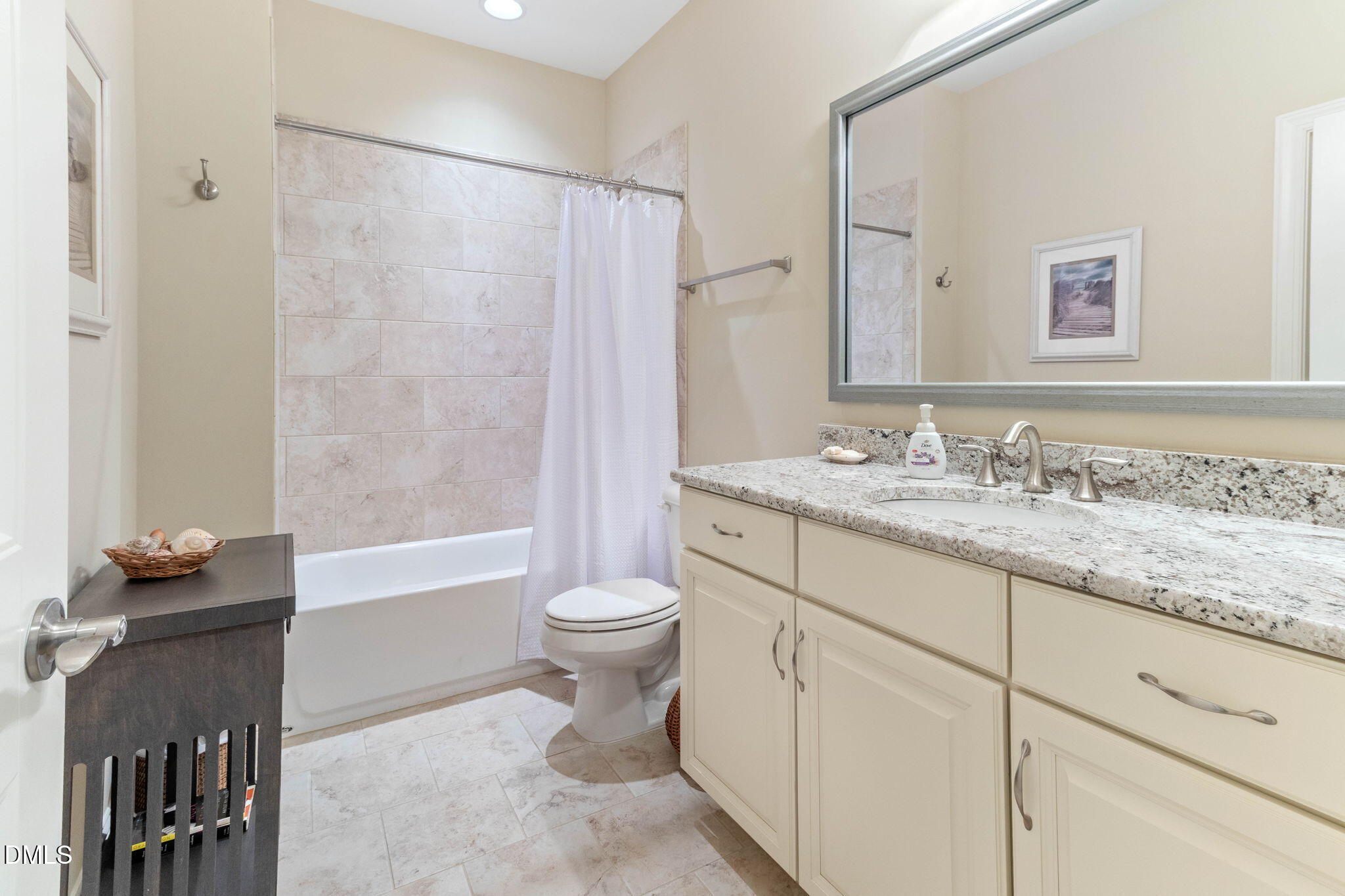 7740 Wilderness Road Raleigh, NC 27613 - Photo 32 of 47 a bathroom with a granite countertop sink toilet and shower