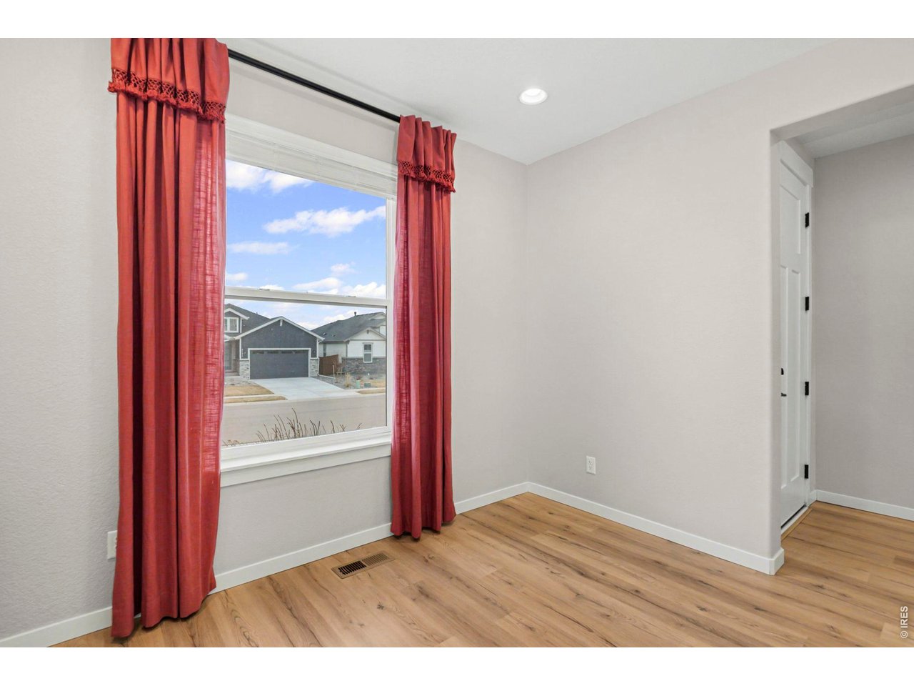 2124 Glean Court Windsor, CO 80550 - Photo 13 of 40 a view of wooden floor