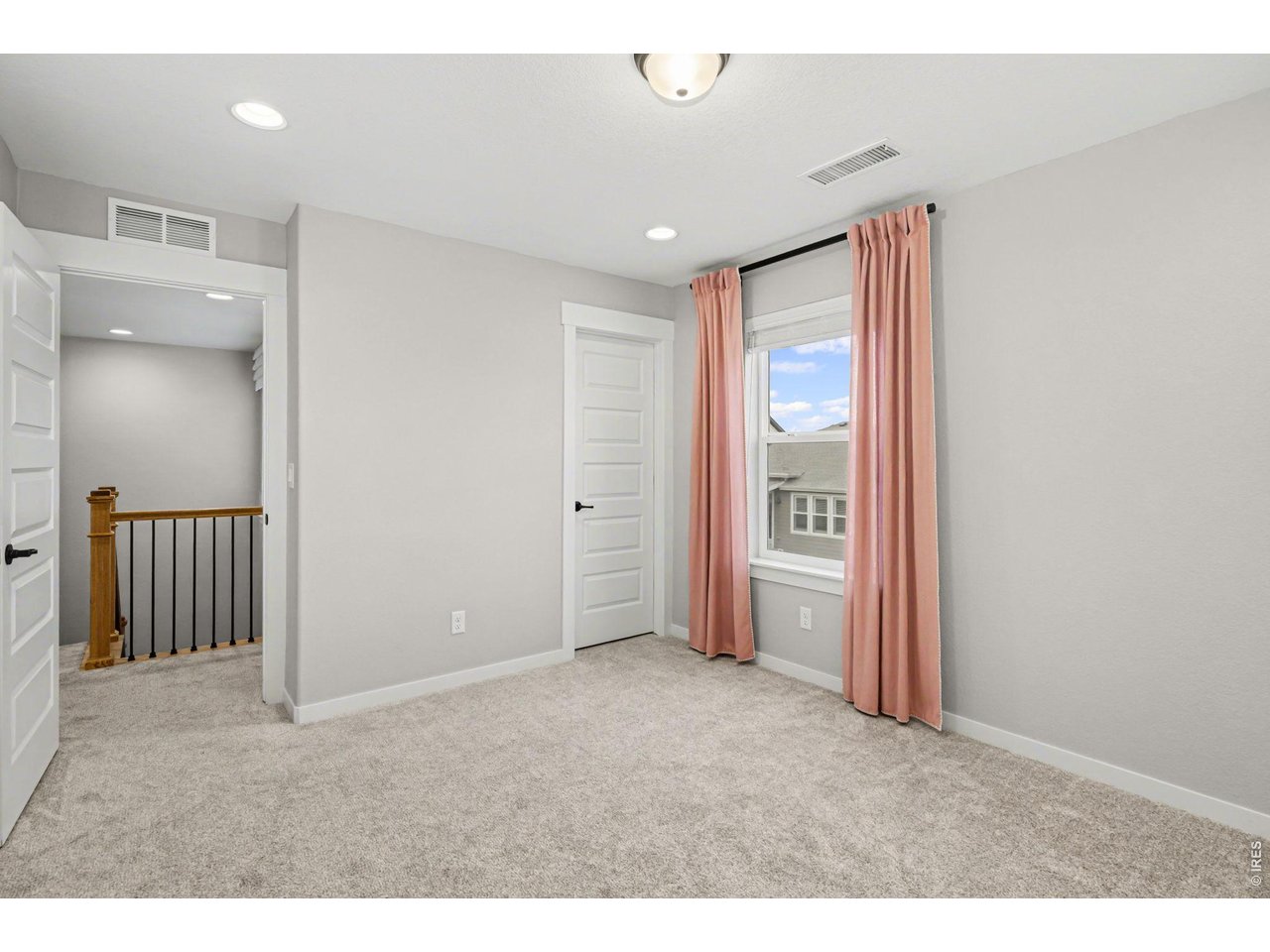 2124 Glean Court Windsor, CO 80550 - Photo 17 of 40 a big room with closet and wooden floor