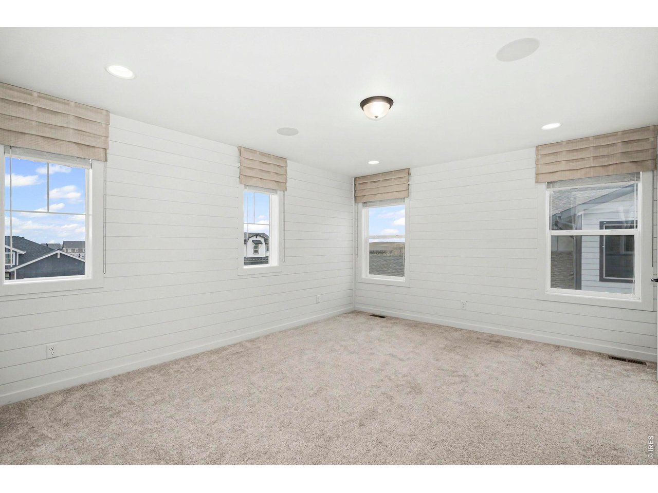 2124 Glean Court Windsor, CO 80550 - Photo 26 of 40 a view of an empty room with a window