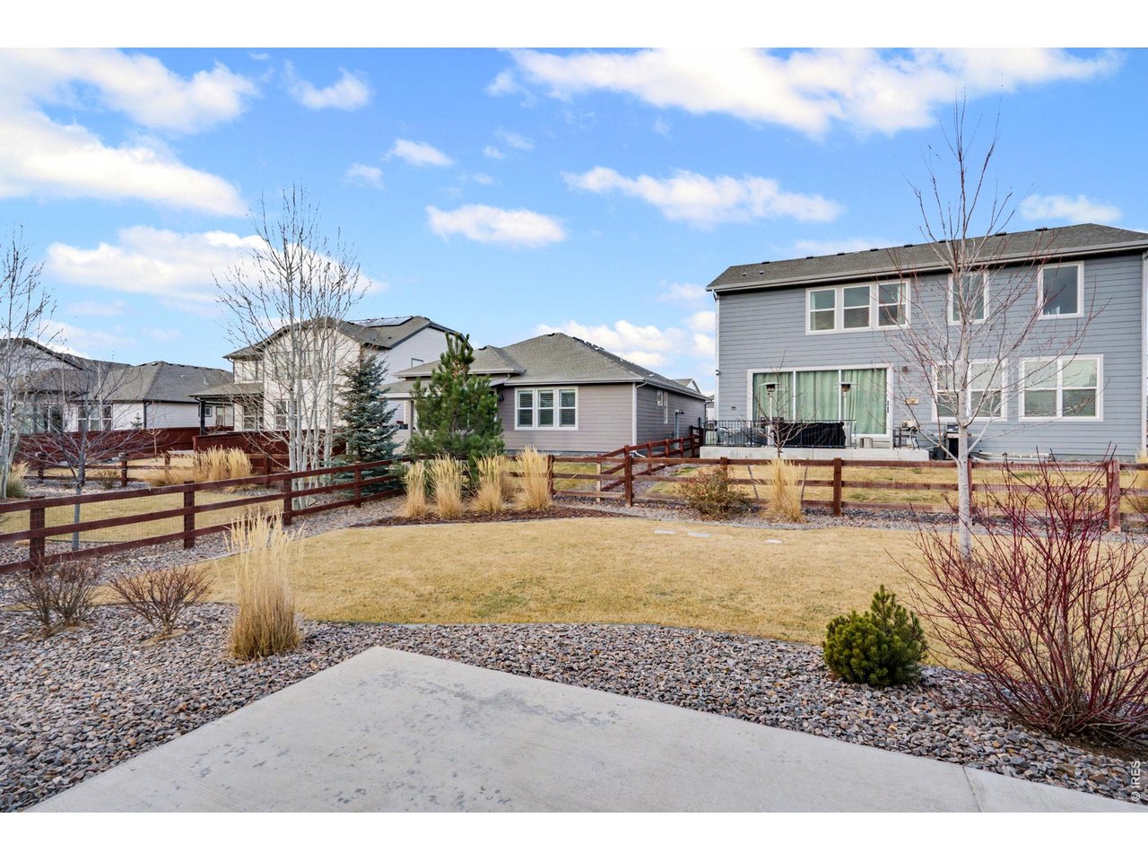 2124 Glean Court Windsor, CO 80550 - Photo 35 of 40 a view of a house with a yard