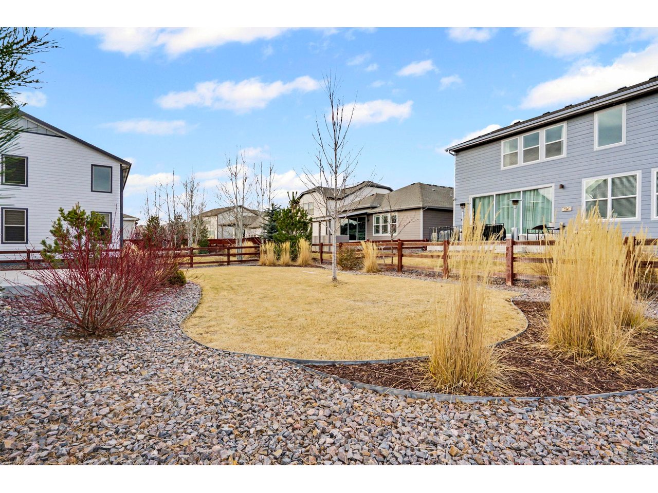 2124 Glean Court Windsor, CO 80550 - Photo 40 of 40 a view of a building with many windows