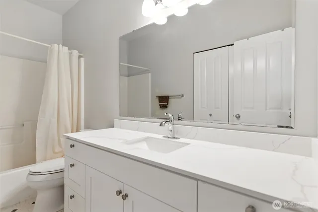 a bathroom with a sink and a toilet