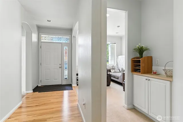 a view of a bedroom from a hallway