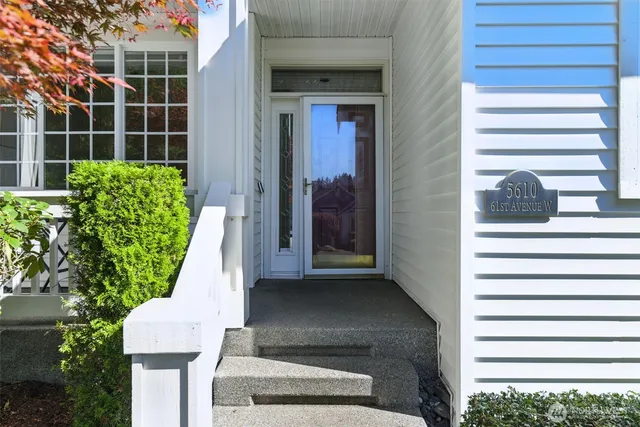 a view of a balcony with chairs