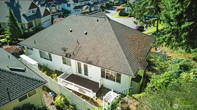 a aerial view of a house with a yard