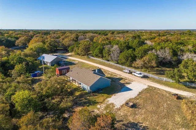 a view of a swimming pool and an outdoor seating