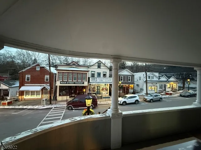 a view of parking with cars parked