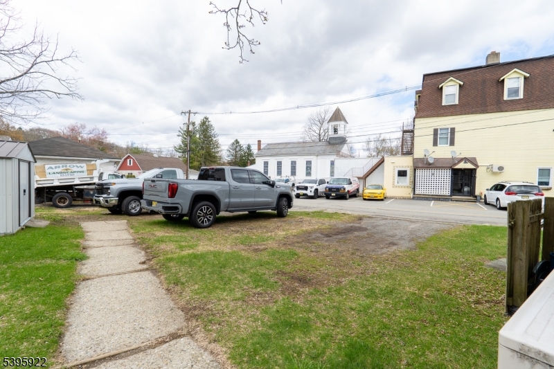 2 Main Street, Unit 1 Branchville, NJ 07826 - Photo 5 of 16 a view of cars parked in front of a house