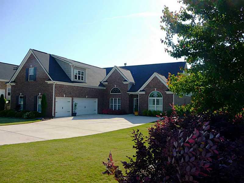 5460 Noah Road Cumming, GA 30041 - Photo 1 of 1 Exterior Front. Stunning home in North Forsyth. Immaculate inside and on a beautiful lot. 3 Car Garage, 4 sides Brick & Level Yard!