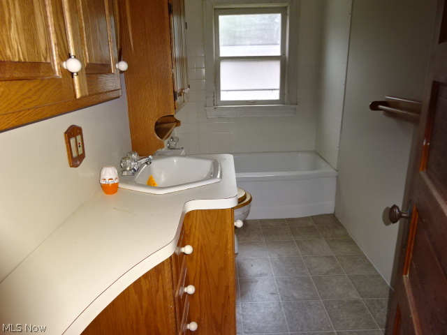 38803 Butternut Ridge Road Elyria, OH 44035 - Photo 13 of 18 Full bathroom with newer vinyl flooring