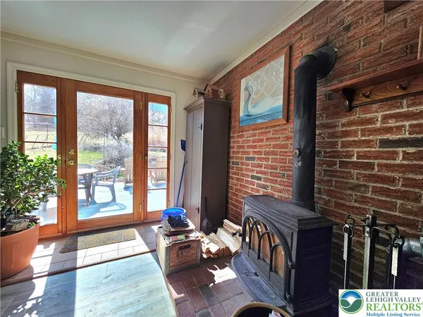 a living room with furniture window and wooden floor