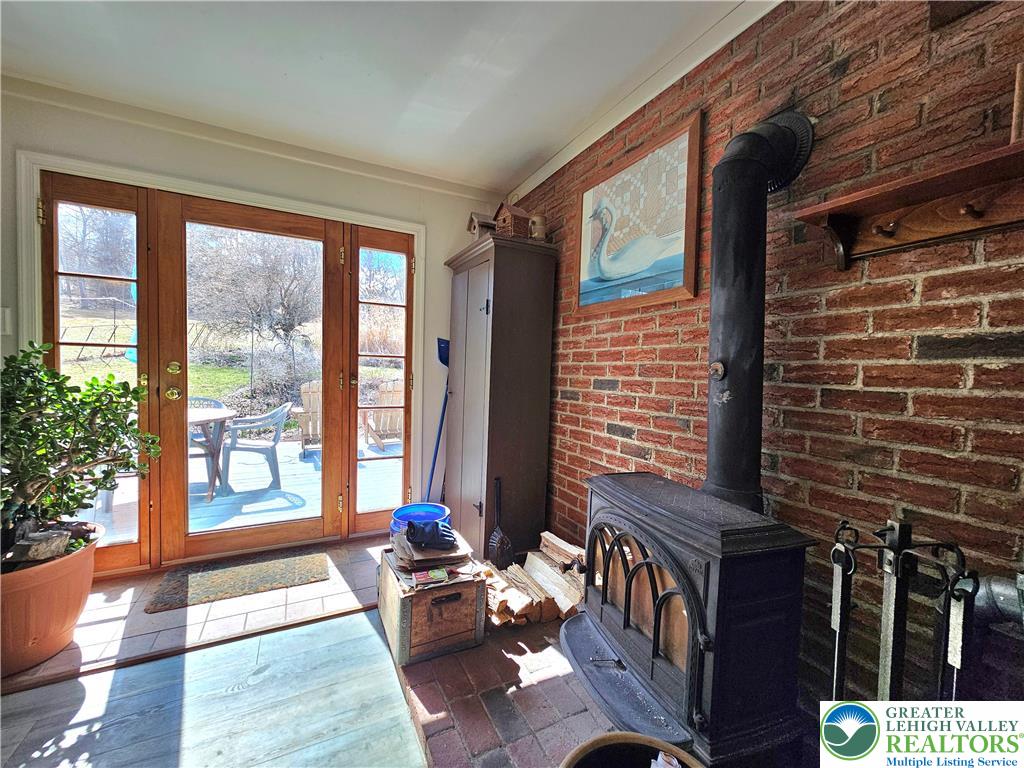 205 Valley View Road Hellertown, PA 18055 - Photo 15 of 27 Triple atrium door-woodstove