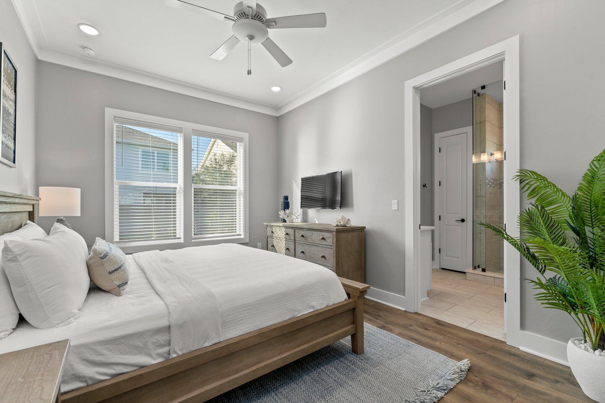 157 West Willow Mist Road Inlet Beach, FL 32461 - Photo 15 of 59 a bedroom with a bed and a potted plant on the dresser
