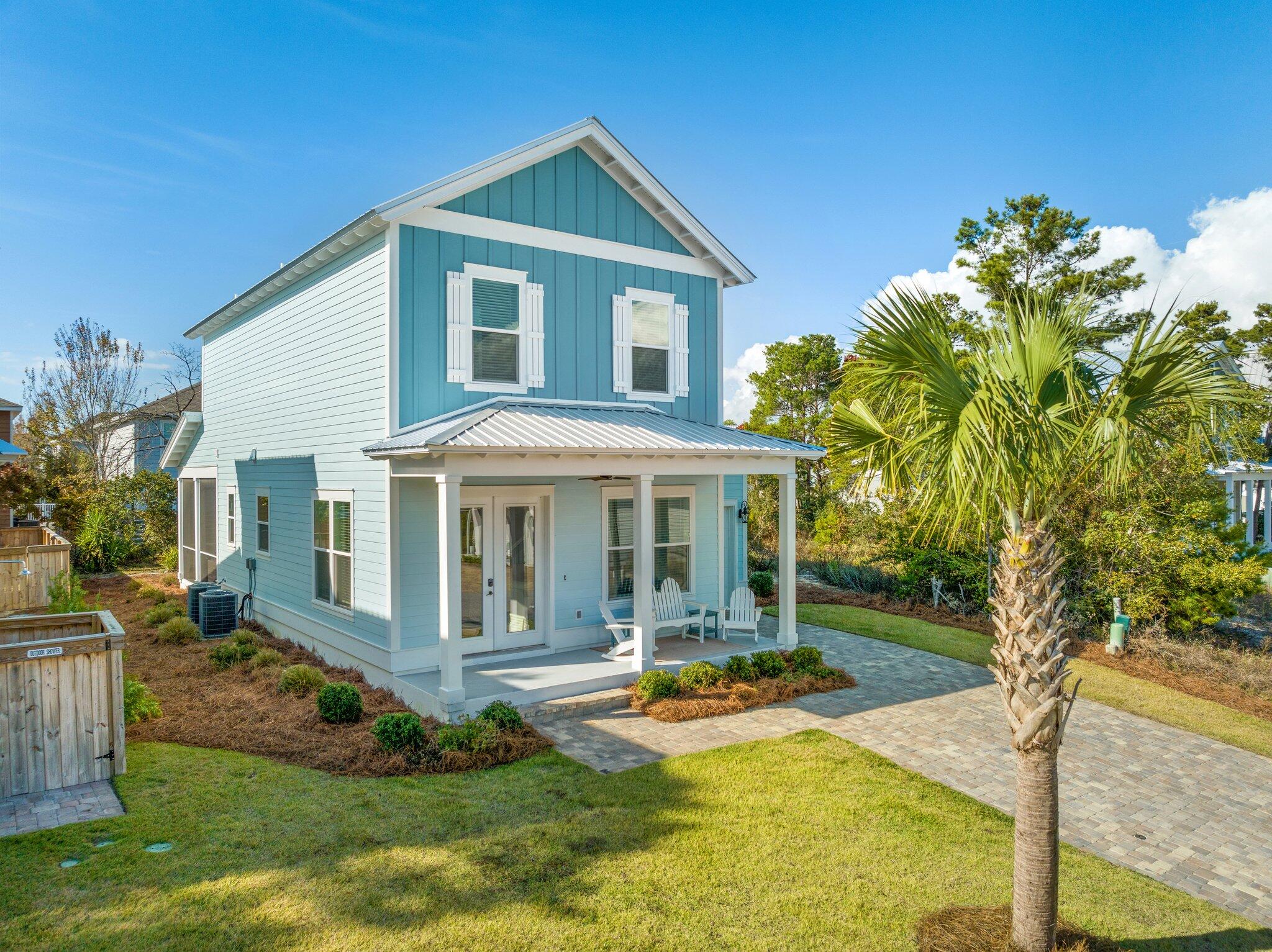157 West Willow Mist Road Inlet Beach, FL 32461 - Photo 2 of 59 a front view of a house with a yard