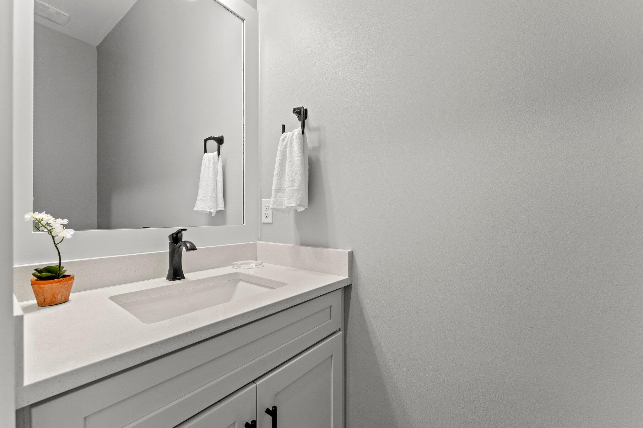 157 West Willow Mist Road Inlet Beach, FL 32461 - Photo 21 of 59 a bathroom with a sink and a mirror