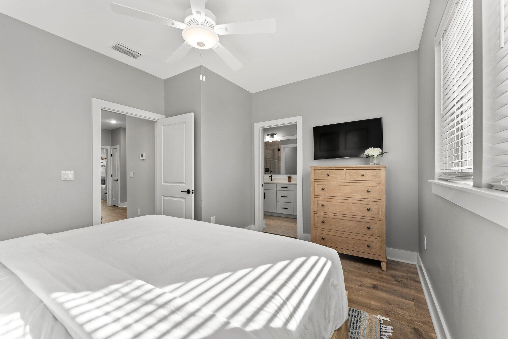 157 West Willow Mist Road Inlet Beach, FL 32461 - Photo 35 of 59 a bedroom with a bed and a flat screen tv