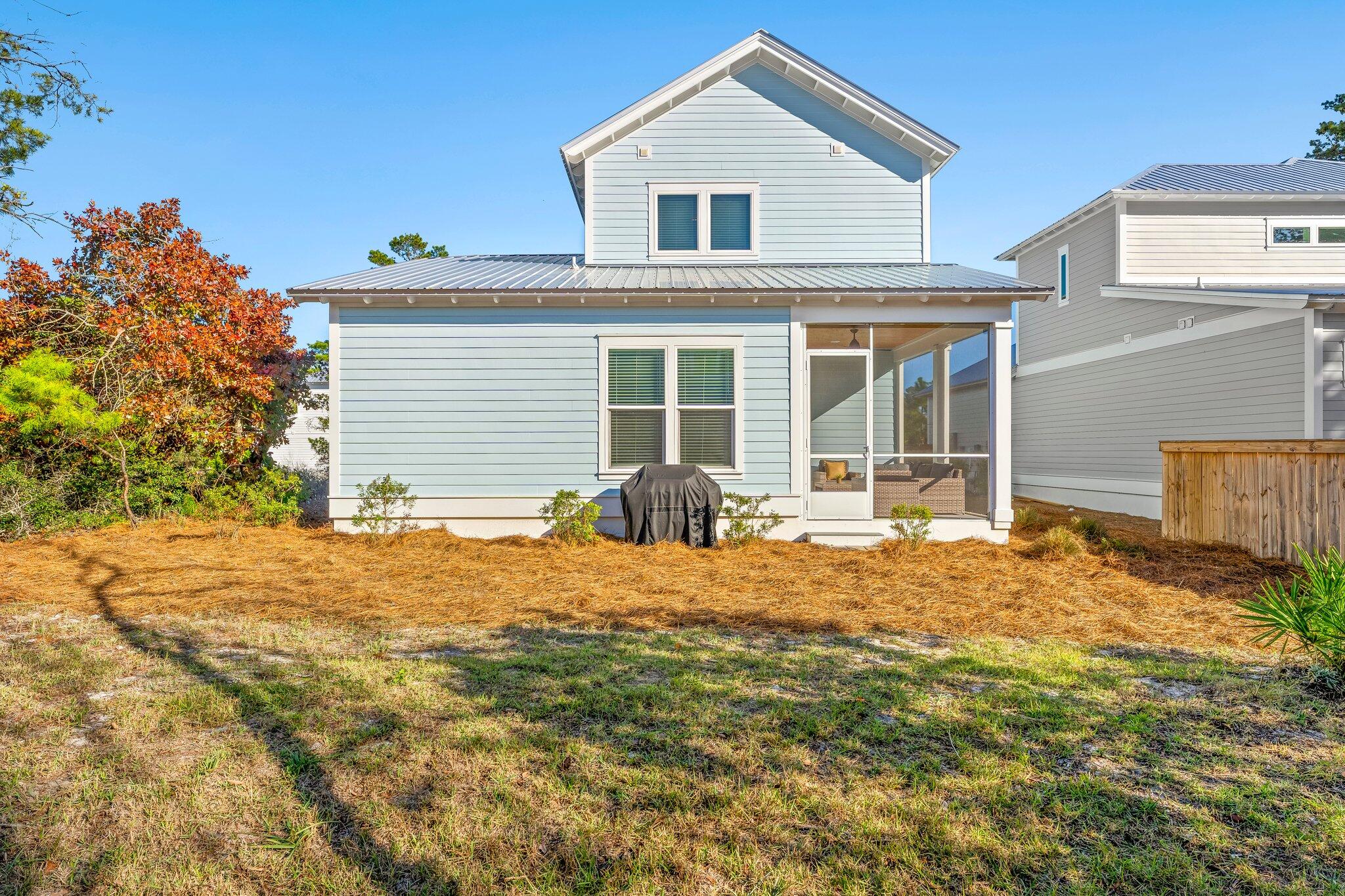 157 West Willow Mist Road Inlet Beach, FL 32461 - Photo 39 of 59 a house with yard in front of it