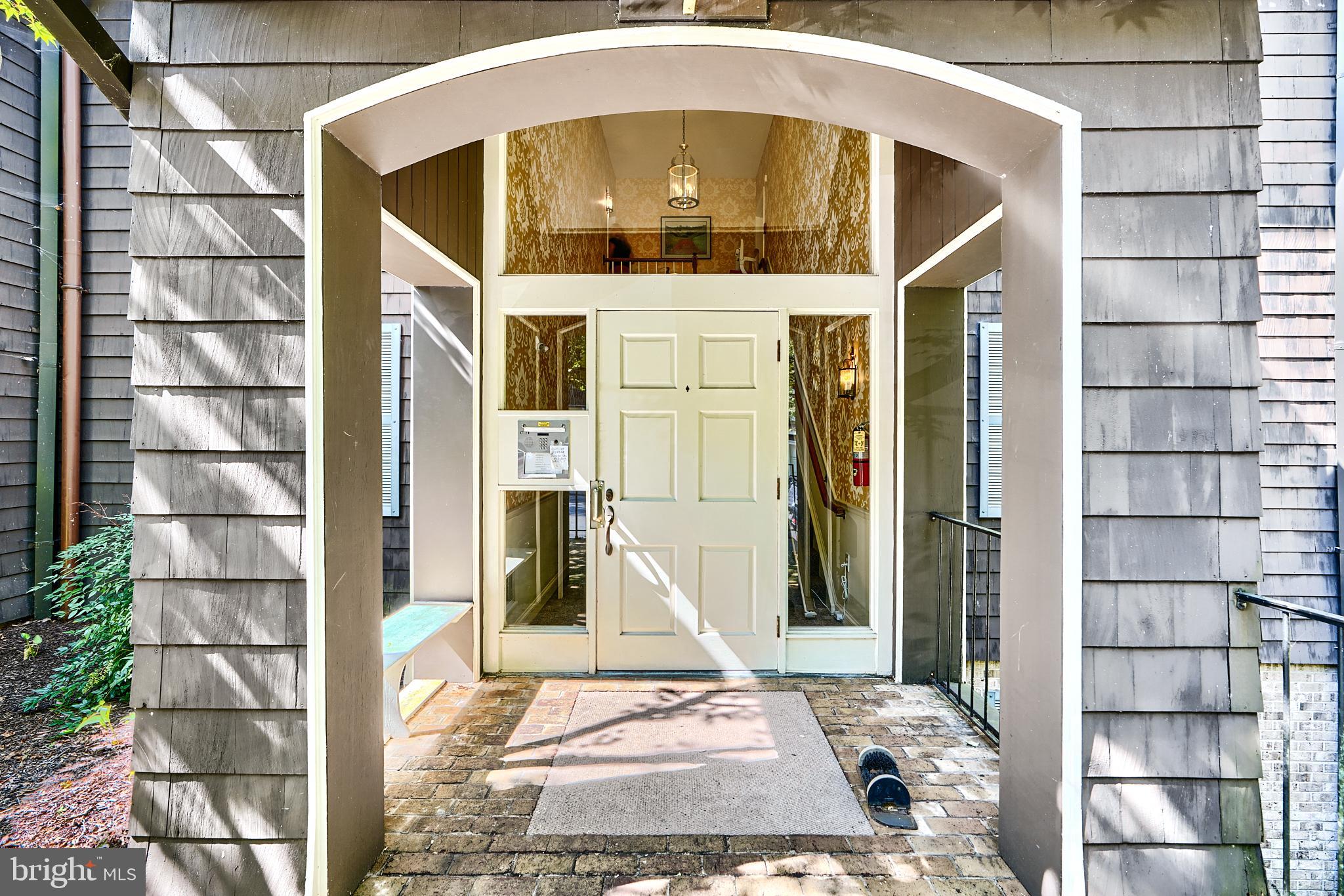 7 Devon Hill Road, Unit A6 Baltimore, MD 21210 - Photo 2 of 61 a front view of a building with a door