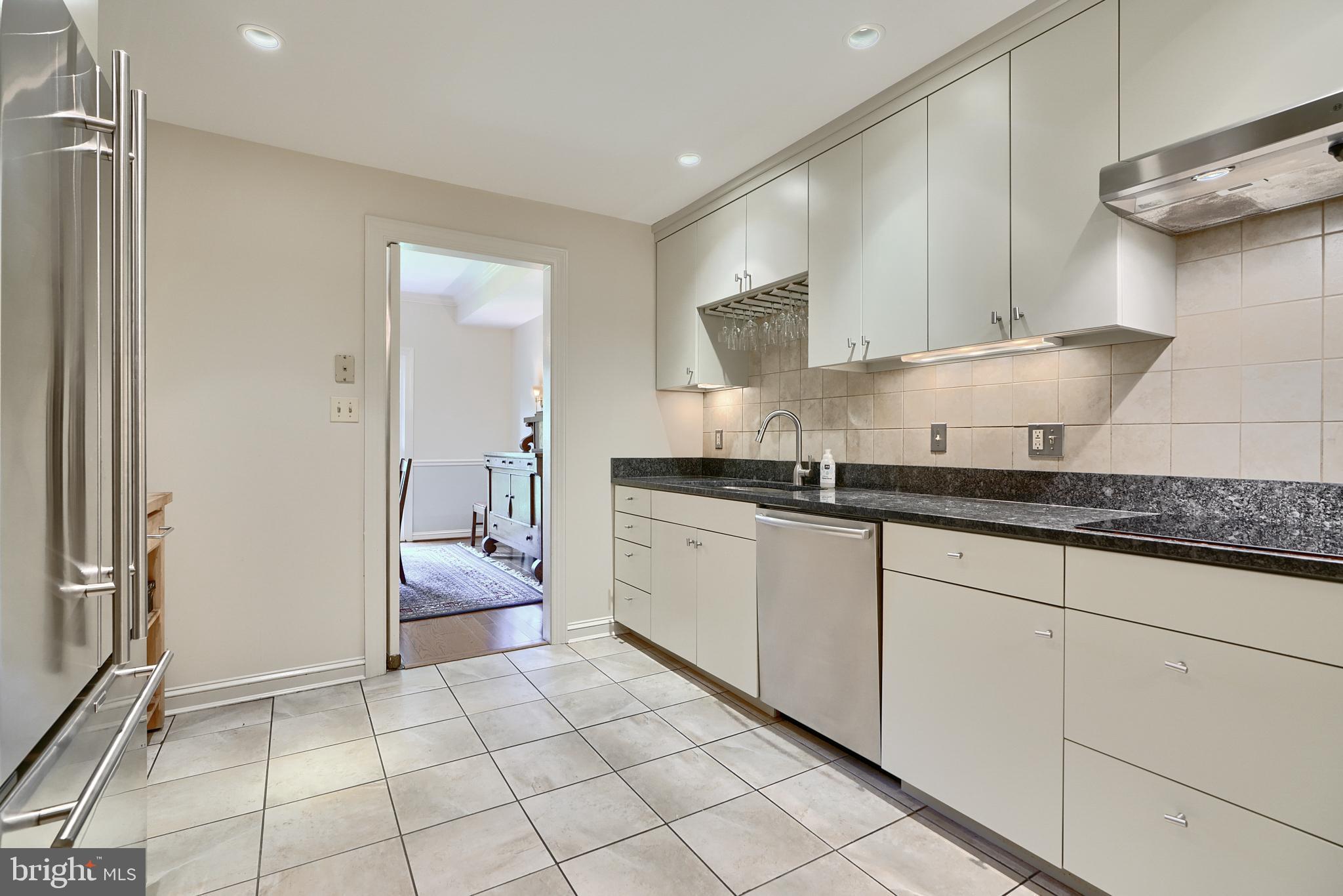 7 Devon Hill Road, Unit A6 Baltimore, MD 21210 - Photo 21 of 61 a kitchen with a sink cabinets and appliances