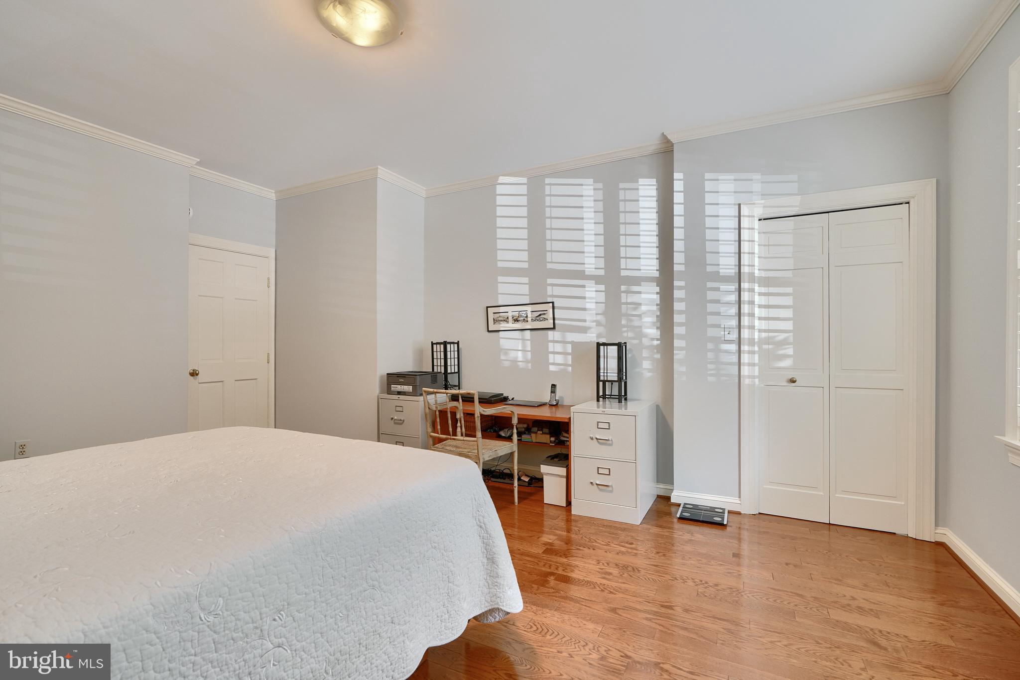 7 Devon Hill Road, Unit A6 Baltimore, MD 21210 - Photo 29 of 61 a bedroom with a bed and a window