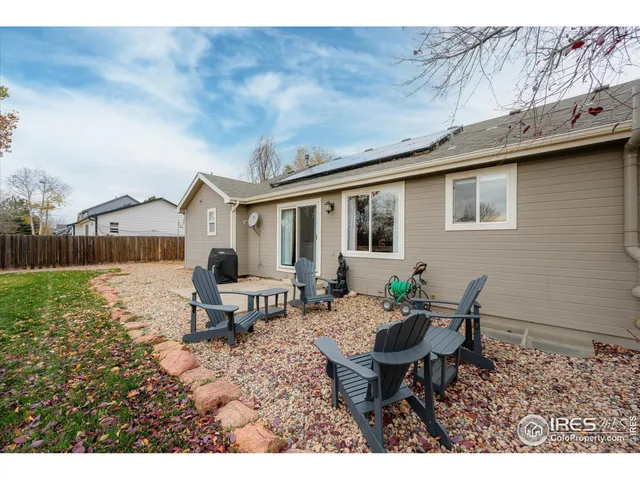 a view of a yard and a house