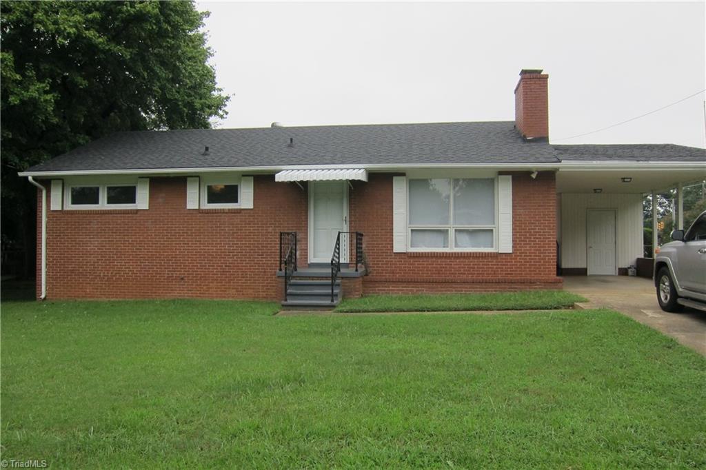 1613 Wolfe Road Greensboro, NC 27405 - Photo 1 of 16 Front Elevation...Single Carport...Laundry Room Access.
