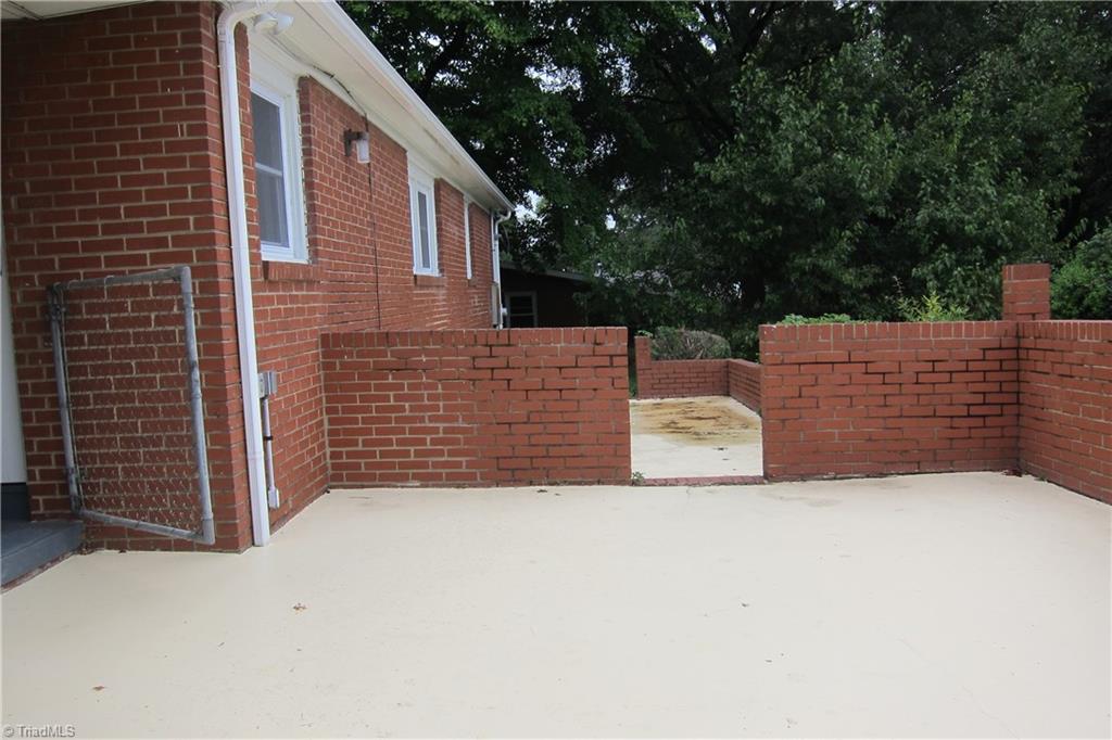 1613 Wolfe Road Greensboro, NC 27405 - Photo 14 of 16 Enclosed Patio.