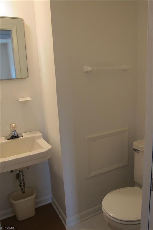 1613 Wolfe Road Greensboro, NC 27405 - Photo 5 of 16 Half Bath In Hallway...New Vinyl Flooring!