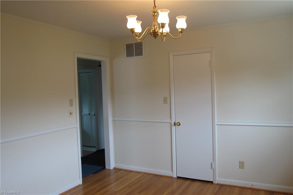 1613 Wolfe Road Greensboro, NC 27405 - Photo 8 of 16 Dining Room with Refinished Floors...Closet.