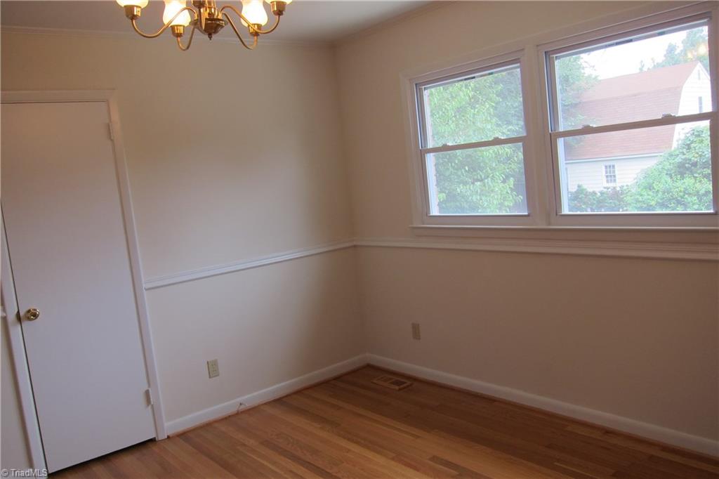 1613 Wolfe Road Greensboro, NC 27405 - Photo 9 of 16 Dining with Double windows...good light.