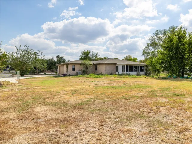a view of a swimming pool with an ocean view