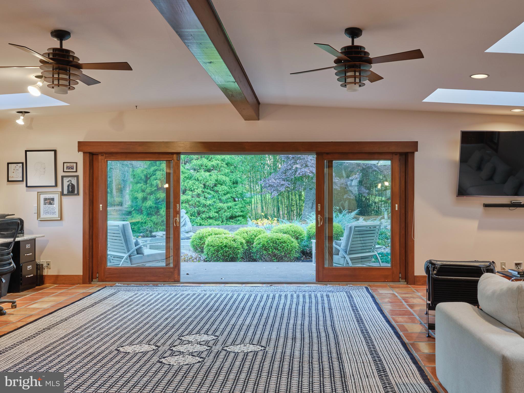1886 Aquetong Road New Hope, PA 18938 - Photo 24 of 68 great room telescoping doors