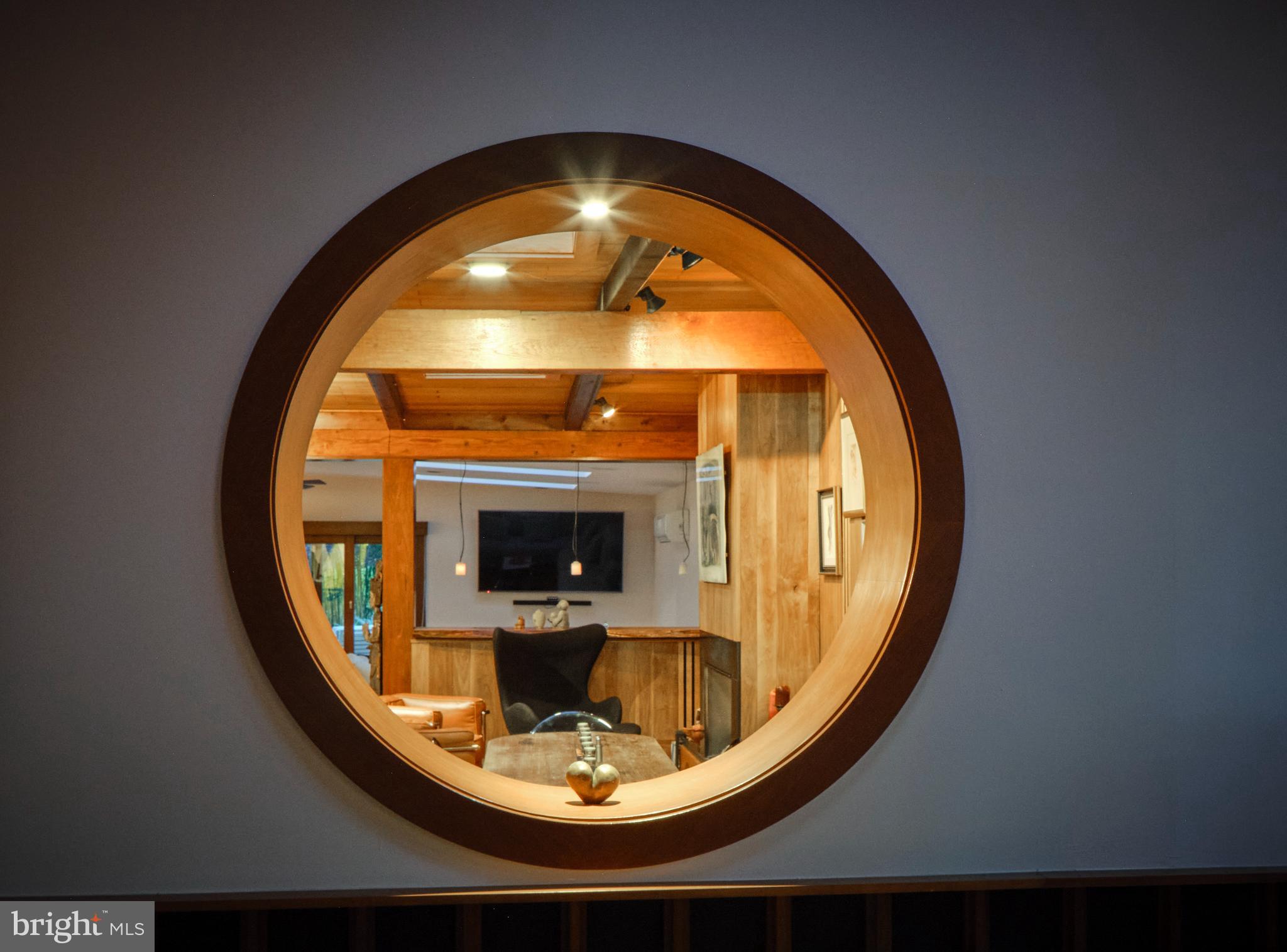 1886 Aquetong Road New Hope, PA 18938 - Photo 59 of 68 circular window above koi pond
