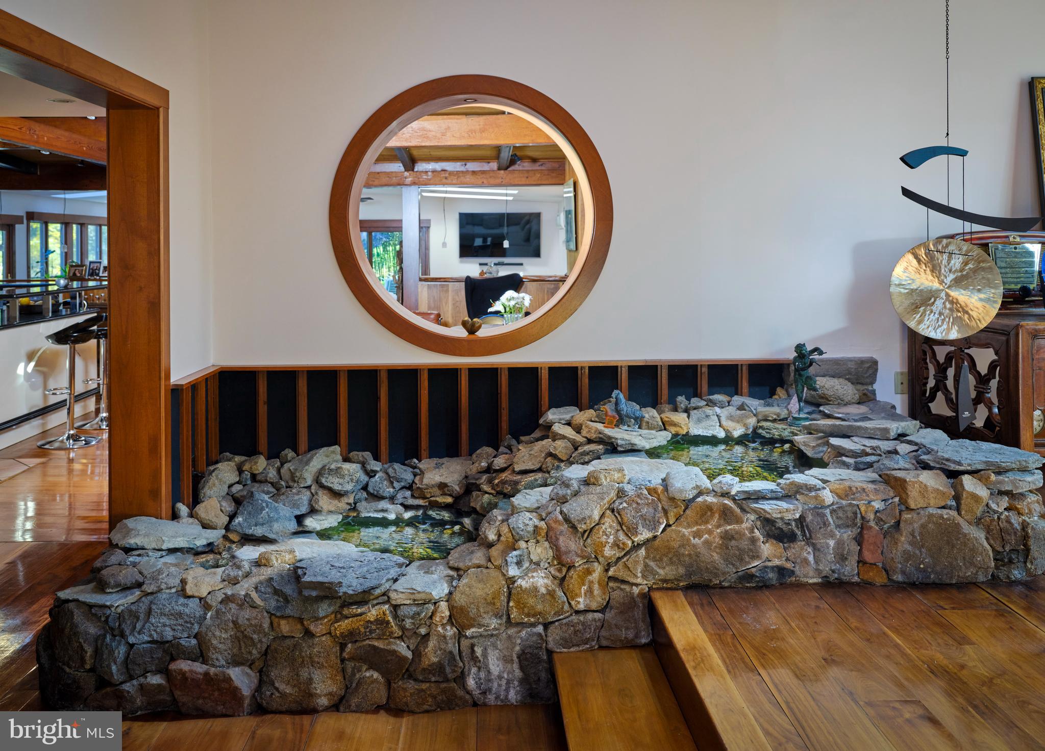 1886 Aquetong Road New Hope, PA 18938 - Photo 8 of 68 foyer tiered rock koi pond