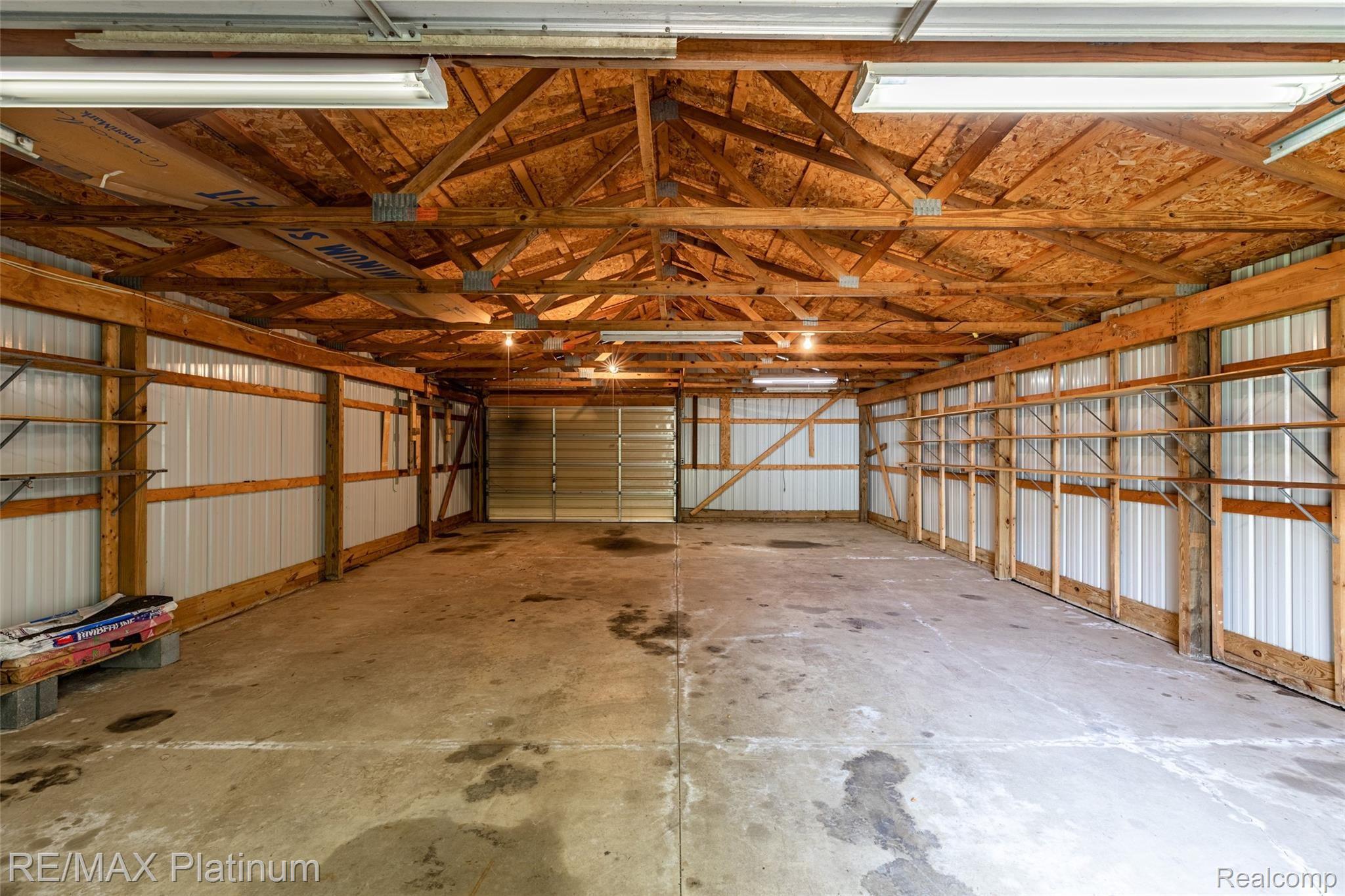 909 Chase Lake Road Howell, MI 48855 - Photo 14 of 37 Look at the storage room to fill...