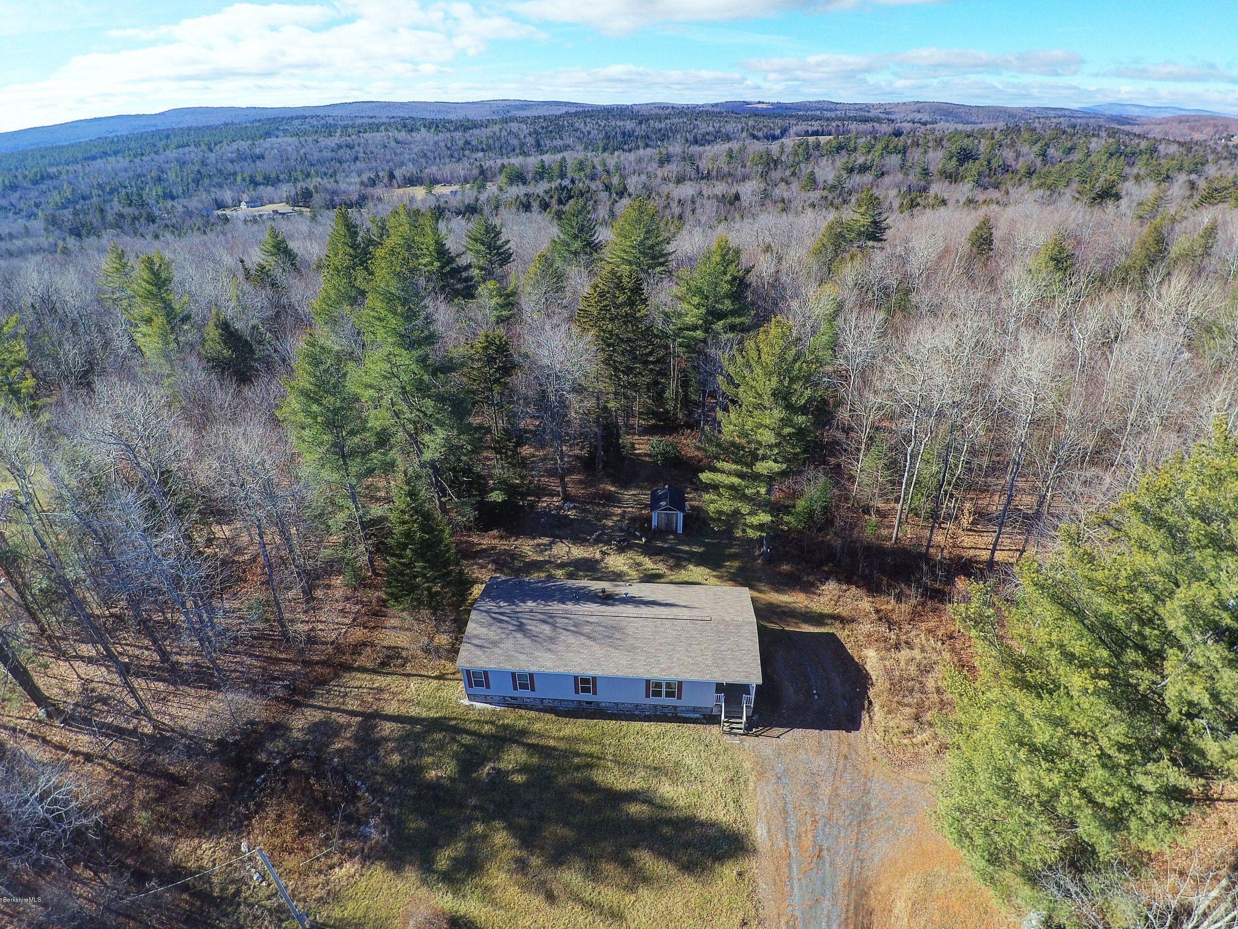 548 Loop Road Savoy, MA 01256 - Photo 11 of 12 a view of a yard with an outdoor space