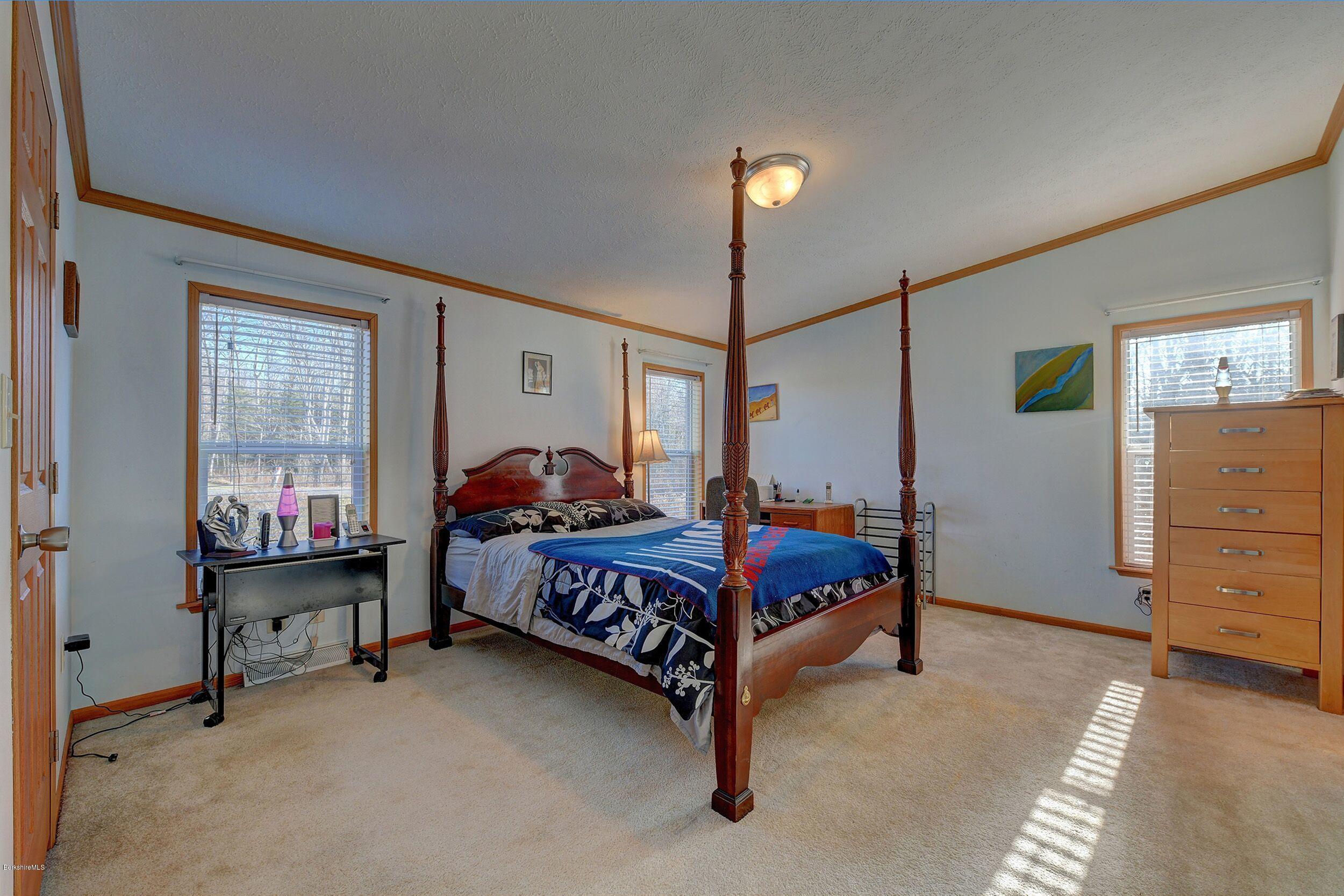 548 Loop Road Savoy, MA 01256 - Photo 6 of 12 a bed room with furniture and a window