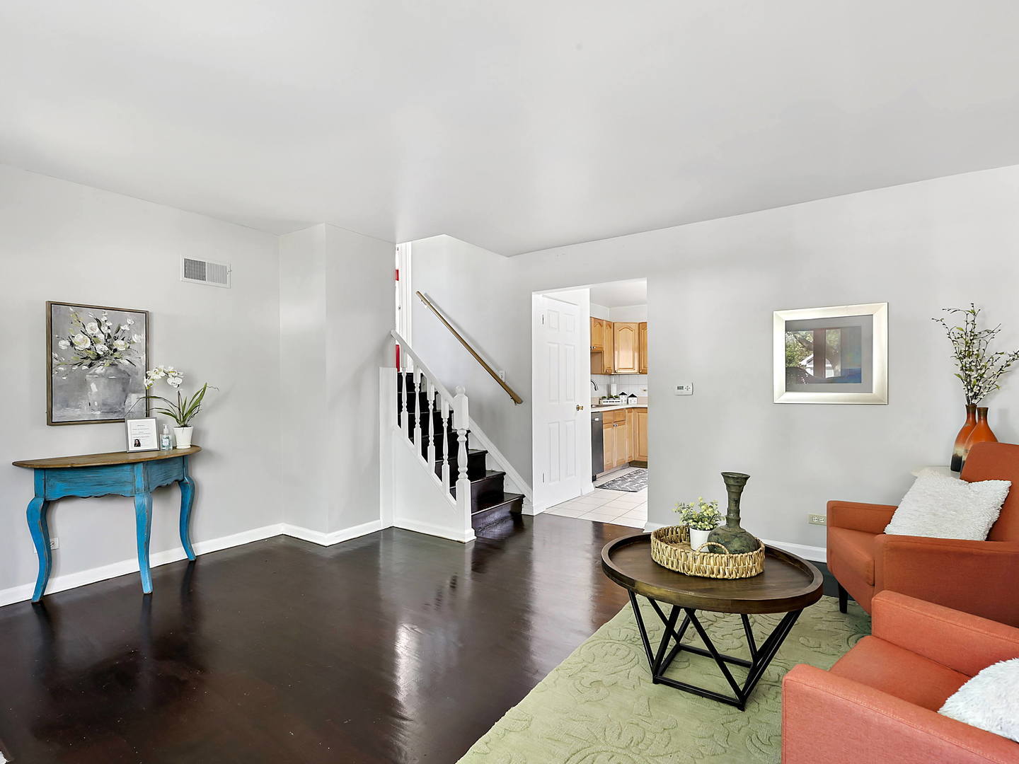 860 Spring Road Elmhurst, IL 60126 - Photo 2 of 17 a living room with furniture and a wooden floor
