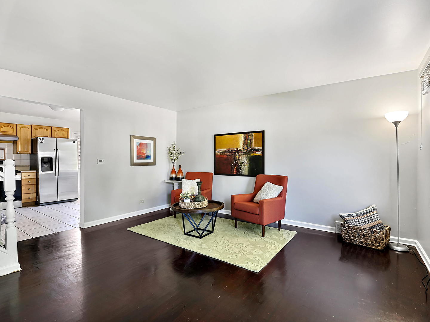 860 Spring Road Elmhurst, IL 60126 - Photo 3 of 17 a living room with furniture and a flat screen tv