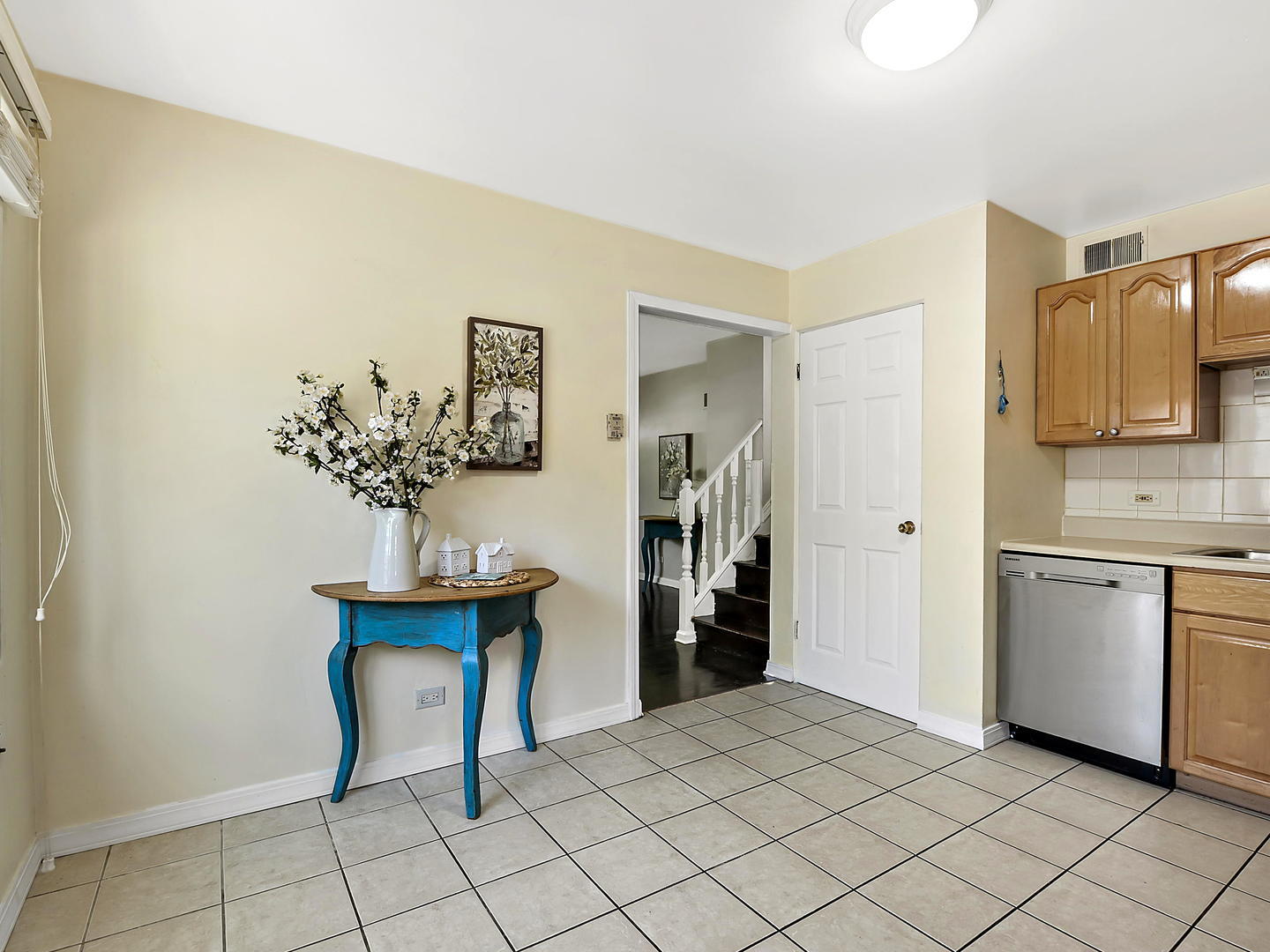 860 Spring Road Elmhurst, IL 60126 - Photo 7 of 17 a spacious bathroom with a sink and a mirror