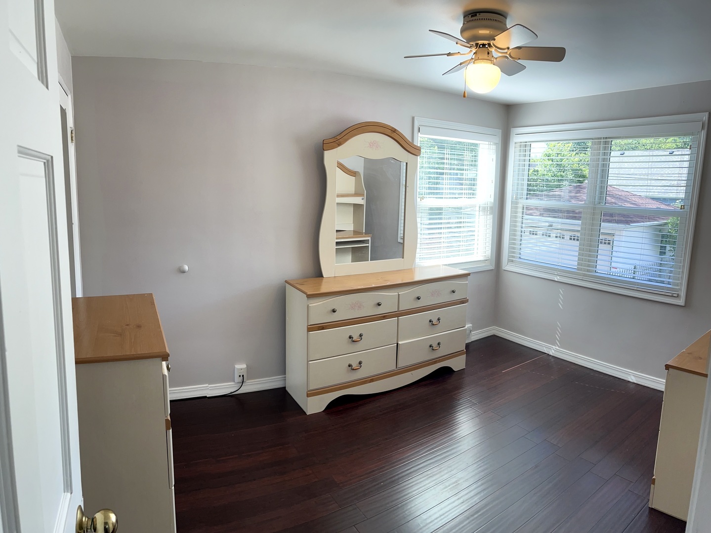 860 Spring Road Elmhurst, IL 60126 - Photo 9 of 17 a room with wooden floors and windows