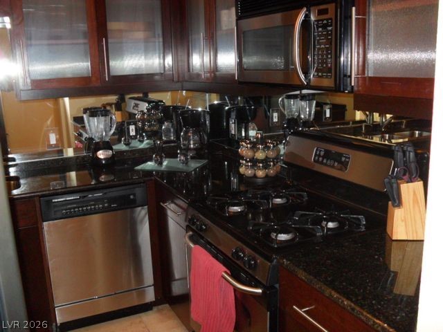 270 East Flamingo Road, Unit 436 Las Vegas, NV 89169 - Photo 3 of 19 This kitchen showcases ample cabinet space, with granite counters providing an ideal cooking area.