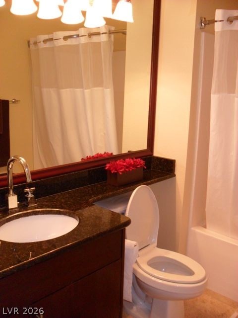 270 East Flamingo Road, Unit 436 Las Vegas, NV 89169 - Photo 9 of 19 This bathroom features a contemporary vanity with a sleek granite countertop.