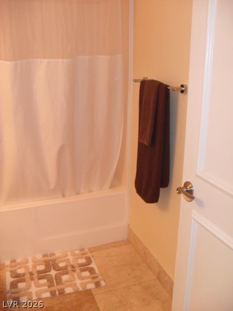 270 East Flamingo Road, Unit 436 Las Vegas, NV 89169 - Photo 10 of 19 This clean bathroom provides a functional space with tiled flooring and a convenient shower.