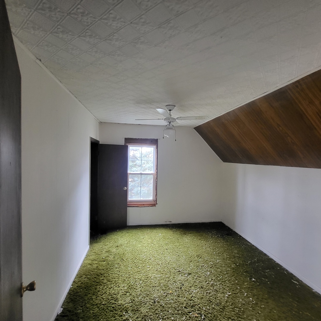 6515 East 5000S Road St. Anne, IL 60964 - Photo 10 of 12 an empty room with windows